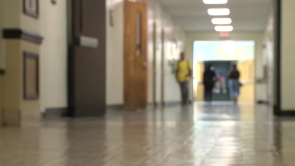One Student Walking In Hallway (3 Of 3)