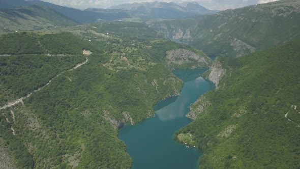 Aerial view of mountains and Piva lake in Montenegro in summer time