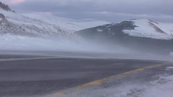 snowstorm asphalt road
