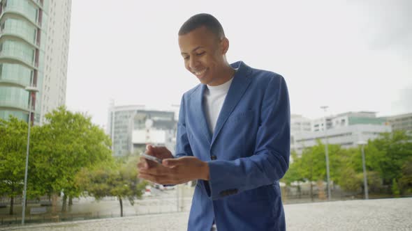 Emotional Young Man During Video Call Through Smartphone