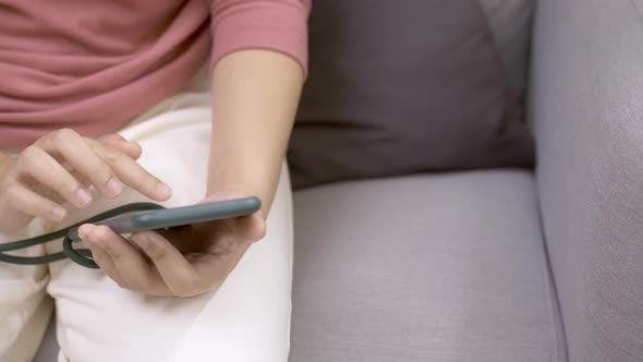 Woman hands using a smartphone to social media. Technological addiction concept.