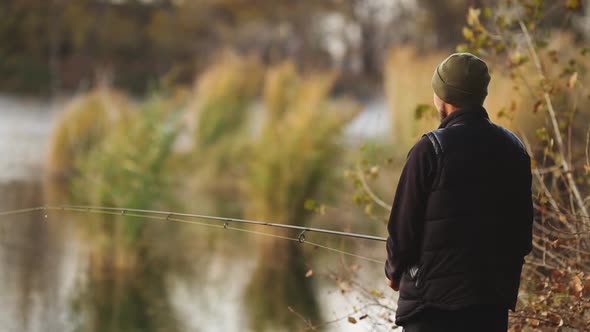 Fisherman Catches A Fish