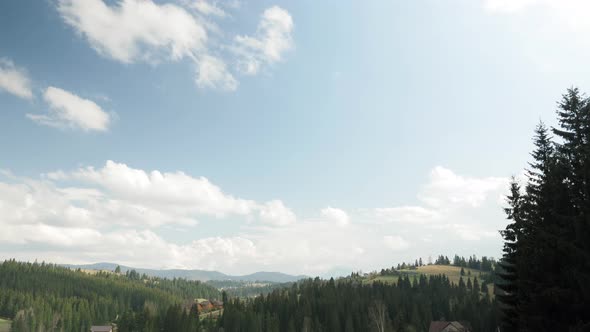 Time lapse of beautiful mountain landscape with cloudy blue sky