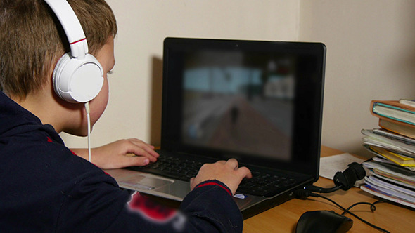 Young Boy Playing Video Games