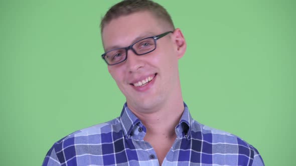 Face of Happy Young Hipster Man Smiling