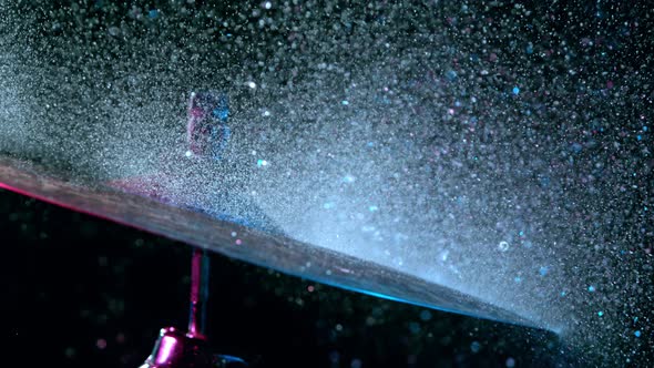 Super Slow Motion Shot of Cymbal Hit and Splashing Water at 1000 Fps