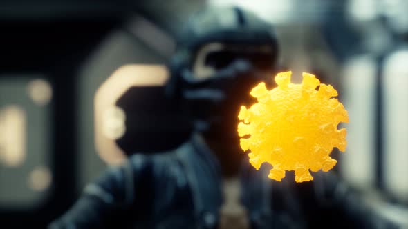 Woman in Protective Medical Mask on Her Face Looking at COVID-19 Coronavirus alt