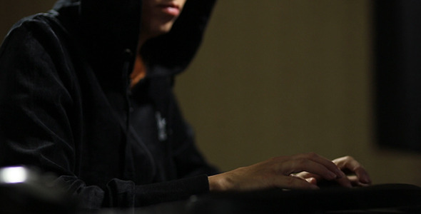 Hacker in Hood  Typing on Keyboard 3