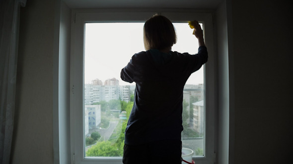 Young Women Cleaning a Window 6 alt