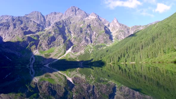 Big and turquoise lake in the Tatra Mountains at sunrise, Poland, Europe