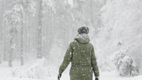 Young Beautiful Caucasian Girl Woman Dressed In Jacket Walking Together With Puppy Dog In Winter