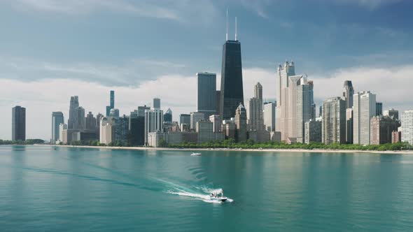 Aerial View Chicago Skyline and Yacht Sailing in Michigan Lake Blue Waters