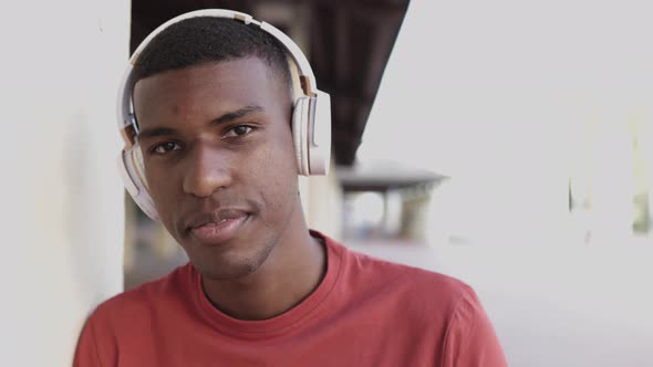 Outdoor Portrait of an African American Young Man with Headphones