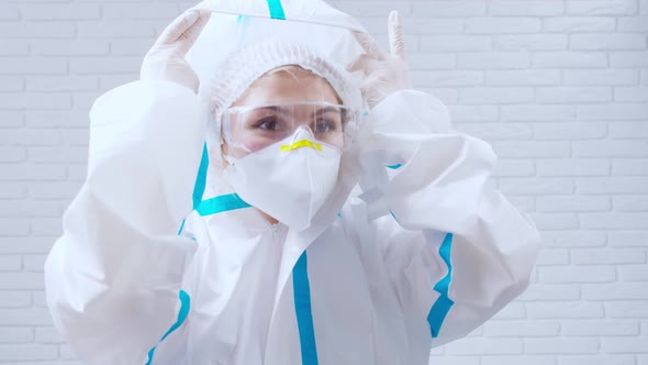 Nurse Wearing Protective Suit Against Coronavirus