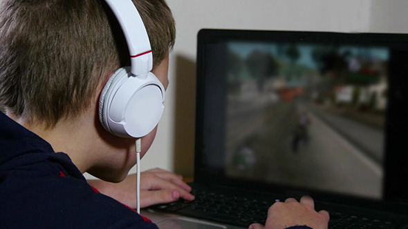 Young Boy Playing Video Games