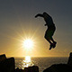 Jumping Across Rocks at Sunrise - VideoHive Item for Sale