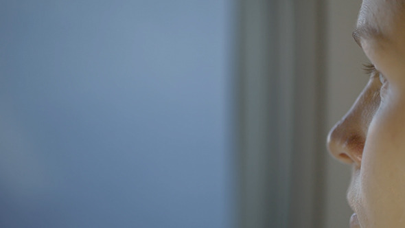 Woman Looking At The Clouds During Flight alt