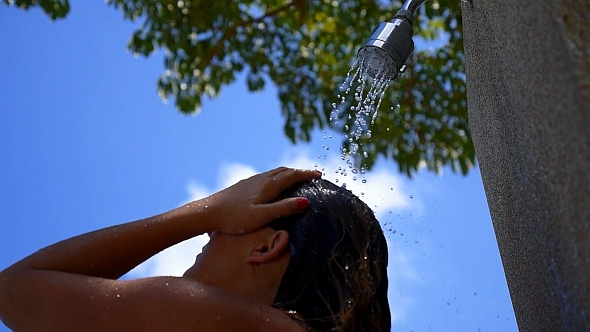 Sexy Girl Taking Shower in Outdoors