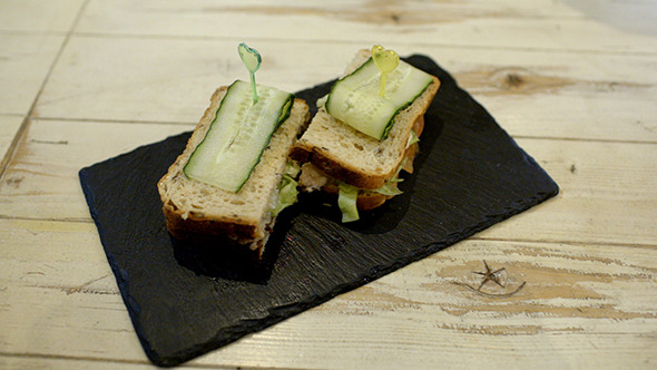 Serving A Portion Of Sandwiches In Cafe