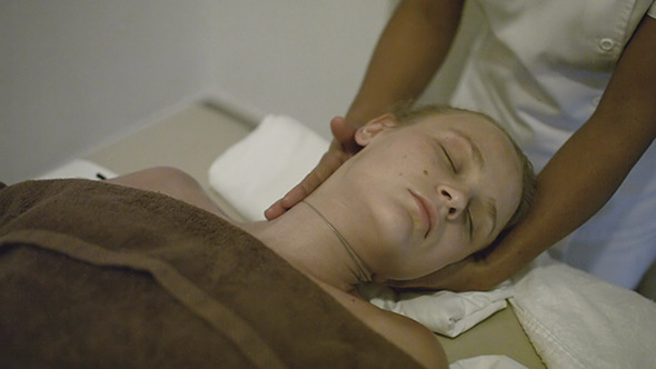 Young Woman Getting Head Massage At Spa