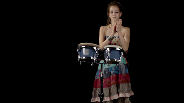 Female Percussion Drummer Performing With Bongos 7