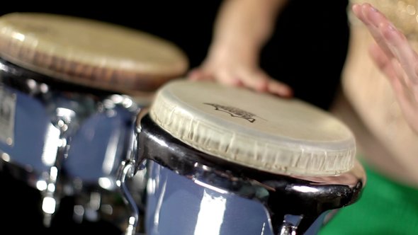 Female Percussion Drummer Performing With Bongos 16 alt