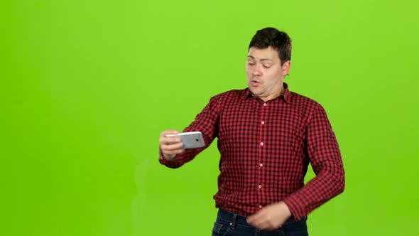 Man Makes a Cheerful Self and Shows a Thumbs Up. Green Screen