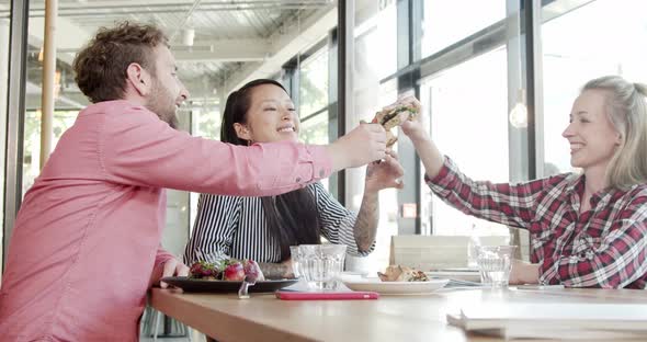 Colleagues having a lunch at a cafe