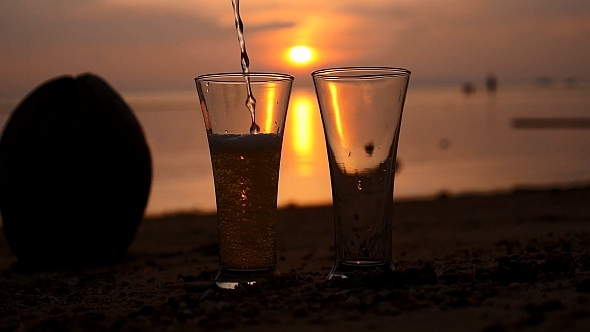 Pouring in Glass at Sunset