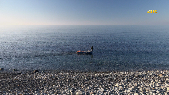 Going Boat on the Calm Sea