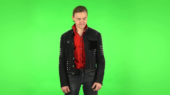 Man in Anticipation of Worries, Then Guilty Hides His Eyes. Green Screen