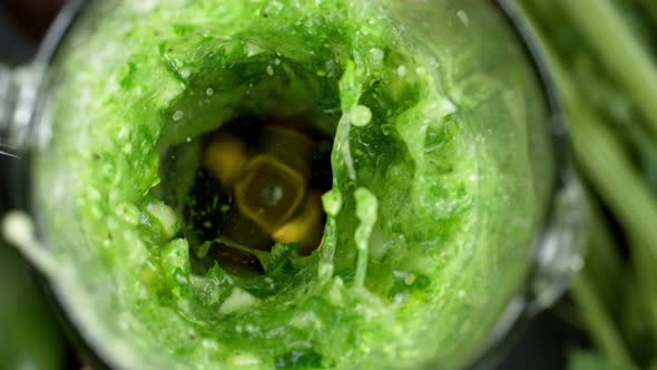 Super Slow Motion Shot of Blending Fresh Green Vegetable at 1000 Fps
