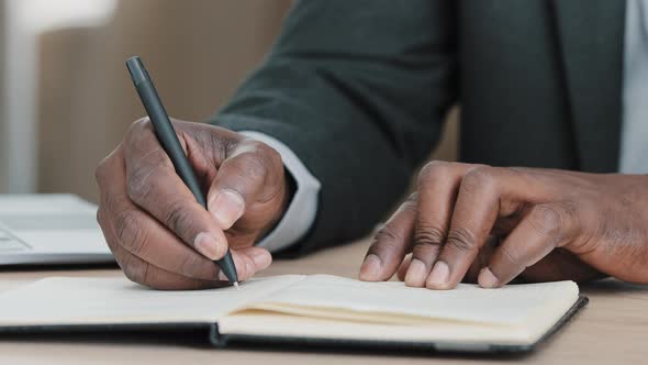 African Old Senior Male Hands Unrecognizable Businessman in Formal Suit Holding Pen Writing New