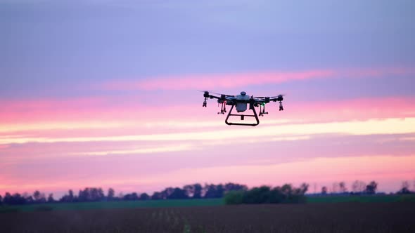 Sunset And Silhouette Of Agrocopter