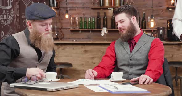 Two Bearded Men After a Business Meeting 