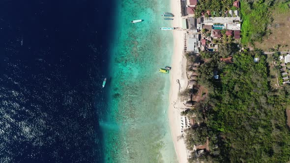 Drone Above Deep Blue Sea And Sandy Beach Coastline