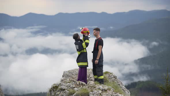 Happy Firefighter with his Wife in the Mountains