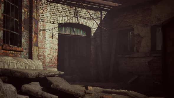 Abandoned Industrial Factory Buildings at Sunset alt