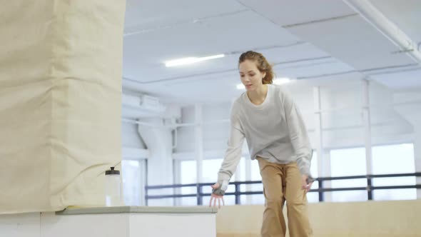 Female Rollerblader Having Break