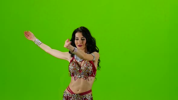 Dancer in Red Dress. Green Screen. Slow Motion