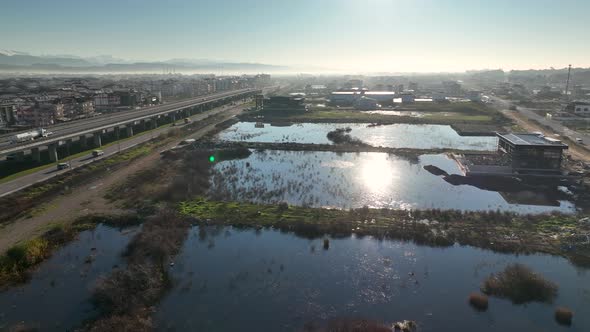 Traffic in the reflection of water aerial view 4 K