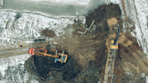 Constructions Site, Heavy Machinery on a Construction Site Working. Aerial View From Above 