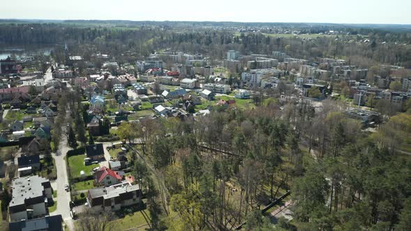 AERIAL: Rotating Shot of Birstonas Town on Sunny Spring Day