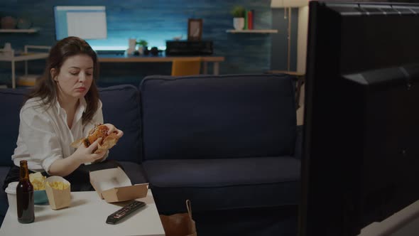 Caucasian Woman Eating Hamburger From Delivery Bag