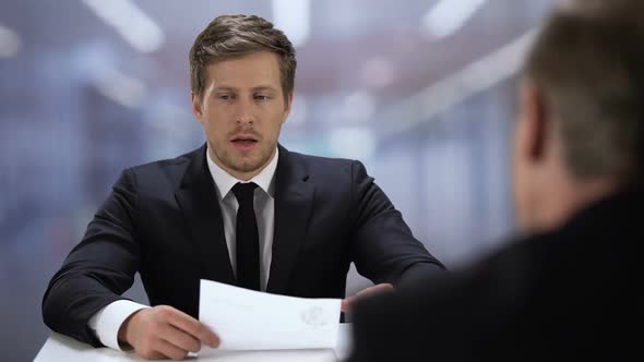 Shy Man Unconfidently Presenting Himself to New Job Position, Lack of Experience