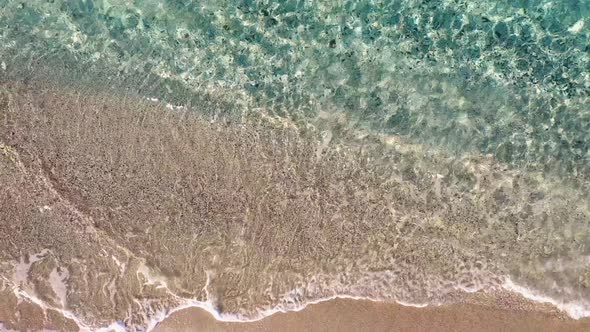 Transparent Tropical Ocean Water on Sandy Beach