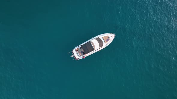 A Large Yacht Stands at Sea Aerial View 4 K