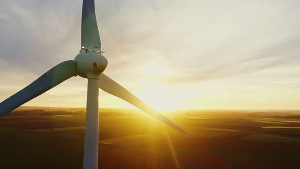 Horizontal Panning From a Drone View of a Wind Farm Among Fields