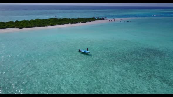 Aerial top view nature of relaxing sea view beach vacation by clear lagoon and white sandy backgroun