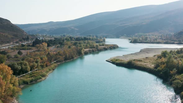 Blue River And Mountains